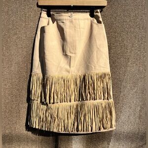 chern fang beige suede midi skirt with tiered fringe trim Tan Suede Fringe Skirt